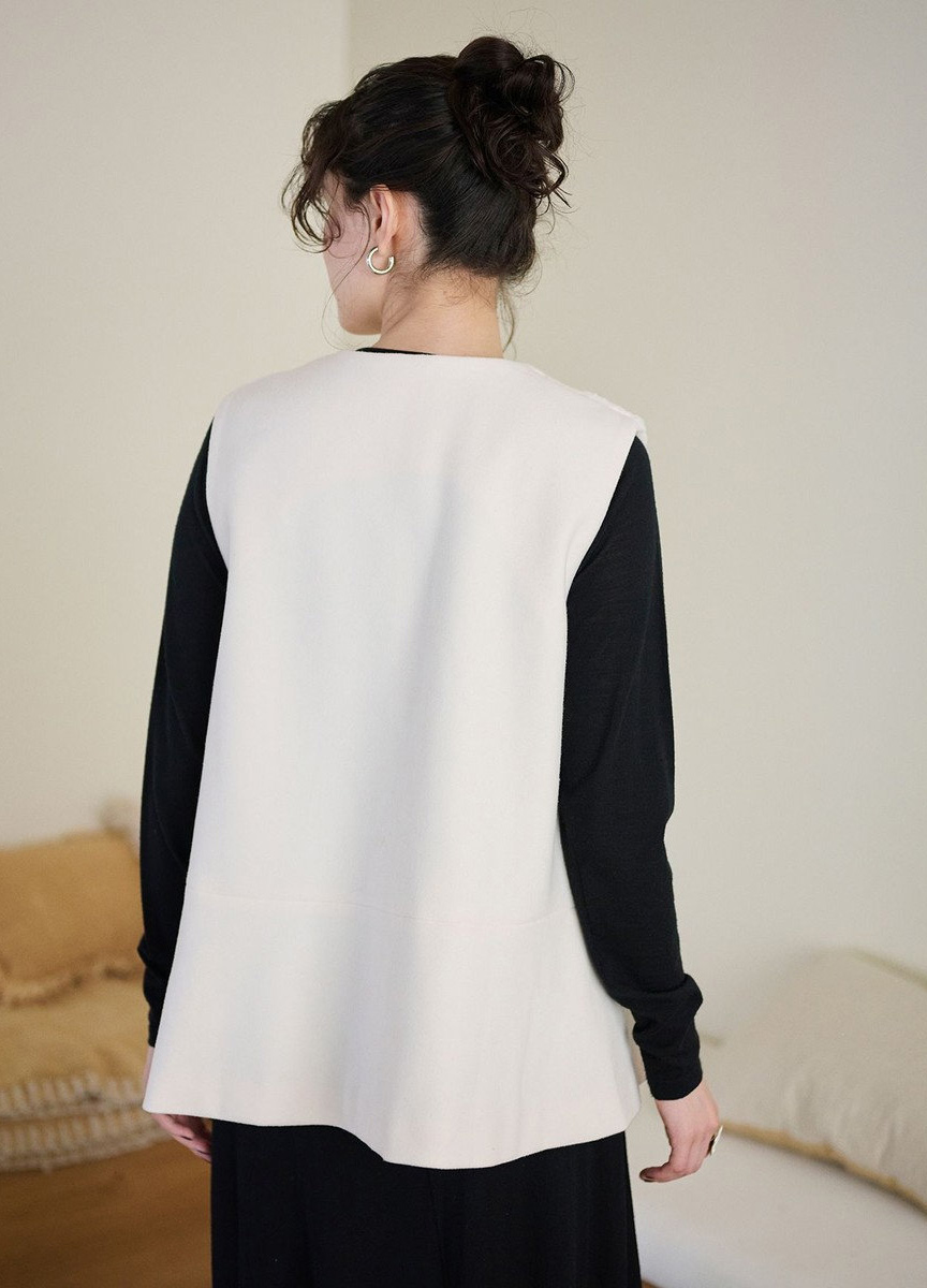 毛絨拼接荷葉下擺背心外套